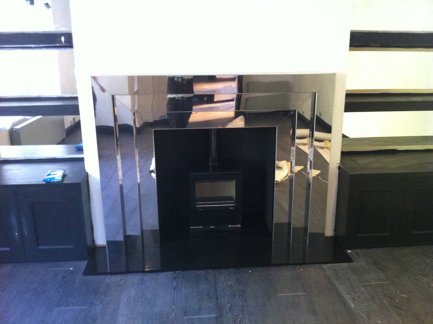 Highly polished Stainless Steel fire surround